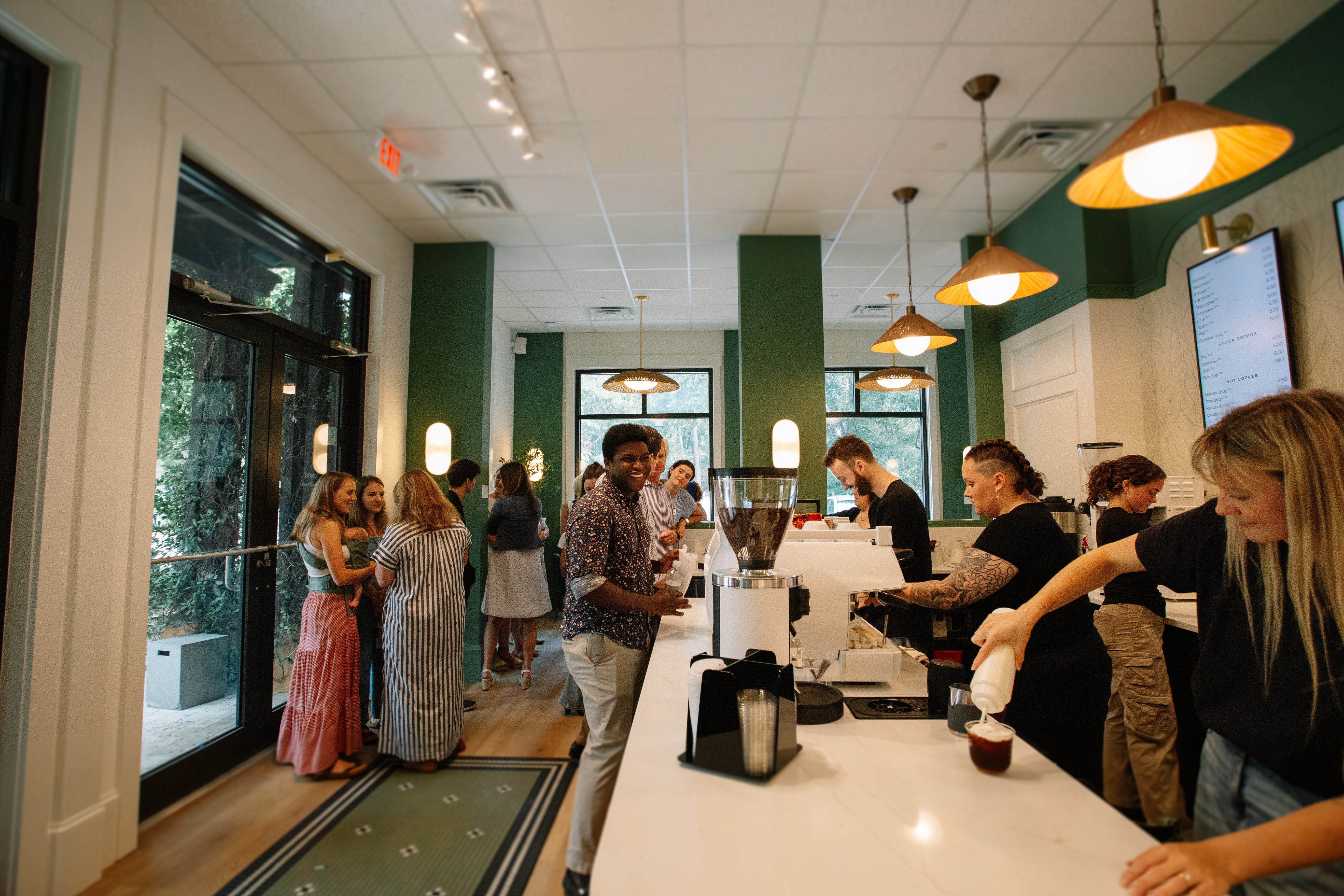 Origin Coffee Bar | Specialty coffee roaster and cafe in Hilton Head Island, South Carolina | Baristas serving guests